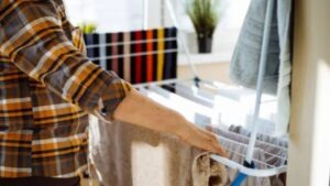 how to dry clothes indoors faster
