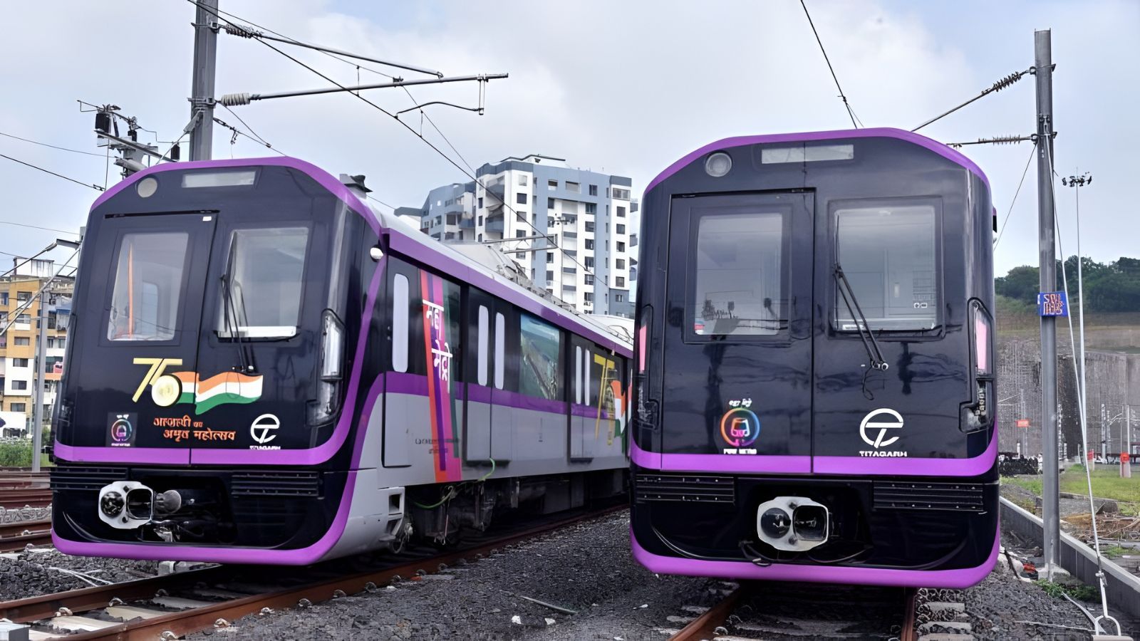 Two purple and black Pune Metro trains on the tracks, featuring the Titagarh logo and 75th Azadi Ka Amrit Mahotsav branding, representing Pune's urban transit infrastructure.