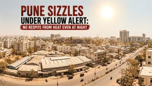 A wide, high-angle panoramic view of Pune's urban landscape under a scorching, bright sun, creating a hazy heat shimmer across the horizon. The image features a mix of traditional low-rise buildings and modern high-rises under a clear, pale sky. In the upper-left corner, a bold headline in English and Marathi reads: "Pune Heatwave: Day & Night, No Respite." The official India Meteorological Department (IMD) logo and a yellow triangle warning icon are positioned below the text, emphasizing the heatwave alert.