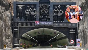 A wide-angle view showing the entrance of the Mumbai-Pune Expressway 'Missing Link' tunnel, featuring large traditional Indian sculptures above the portal and an LED welcome sign in Marathi. A circular inset in the top right shows government officials and dignitaries at the inauguration ceremony.