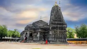A wide-angle shot of Bhimashankar Temple with a clear blue sky in the backdrop.