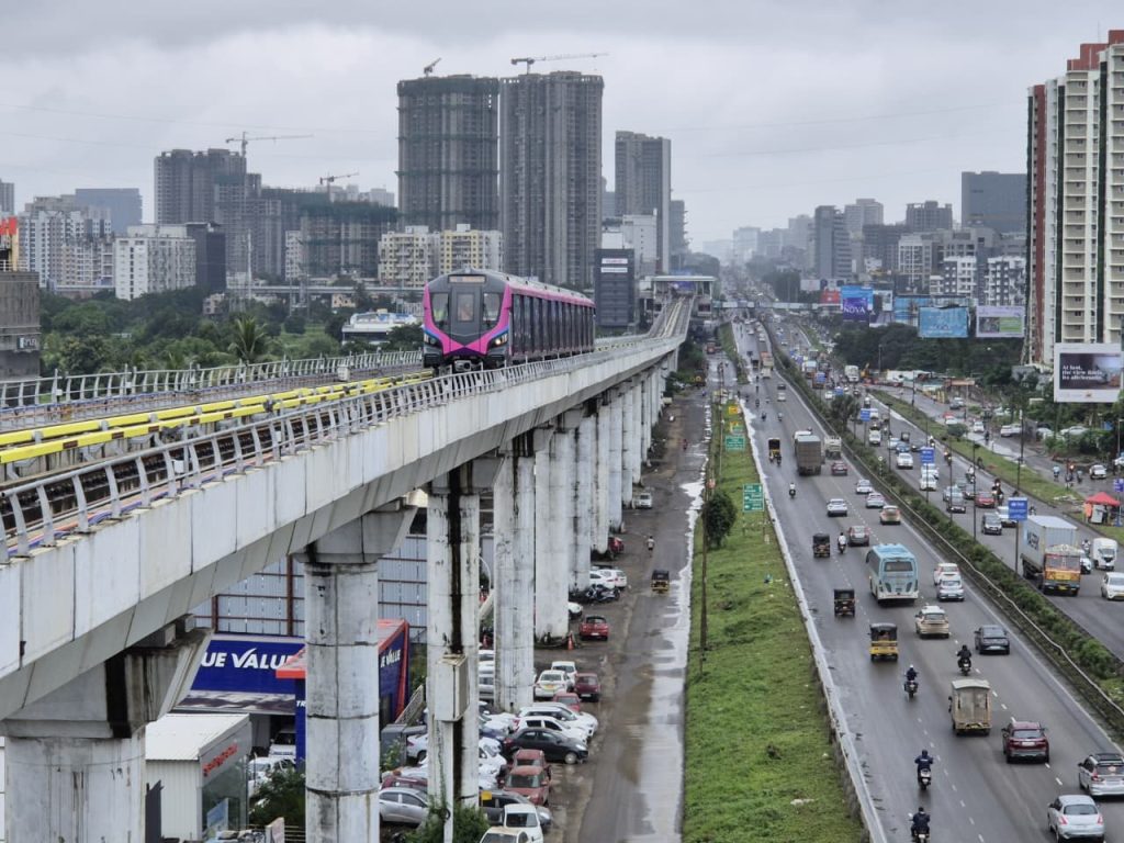 A distant shot of the Hinjawadi-Baner Metro train as seen alongside NH48, conducting trials.