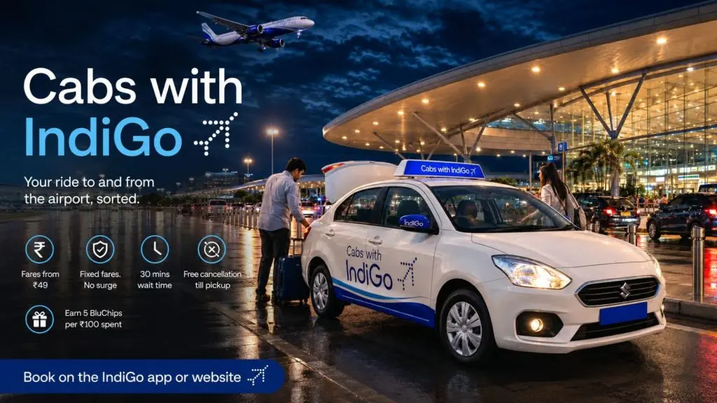 Promotional image showing an IndiGo airport cab parked outside a modern airport terminal at night, with passengers loading luggage and an IndiGo aircraft flying overhead. The graphic highlights the airline's new "Cabs with IndiGo" service, featuring airport pick-up and drop-off, fares starting at ₹49, fixed pricing, free cancellation before pick-up, 30-minute wait time, and BluChip rewards for travellers.