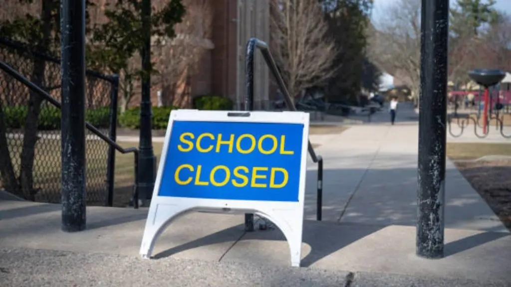 A placard showing school closed.